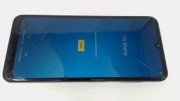 REVVL 4 TMRVL4G (Black 32GB) MetroPCS CRACKED GLAS/BROWN STAINS