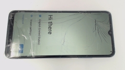 REVVL 6 TMAF025G (Blue 64GB) T-Mobile CRACKED GLAS/BROWN STAINS