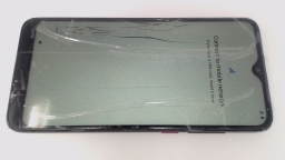 Revvl 4 5007Z Cellphone (Black 32GB) MetroPCS CRACKED GLAS/BROWN STAINS