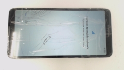 TCL T430W Cellphone (Black 32GB) Unlocked GLAS CRACKED/BROWN STAINS