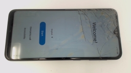 Samsung Galaxy A10e SM-A102U (Blue 32GB) Cricket BROWN STAINS/CRACKED GLAS