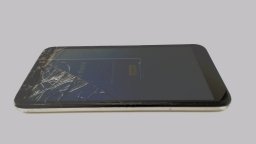 AT&T Calypso 2 U319AA (Silver 32GB) Cellphone CRACKED GLAS