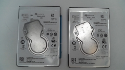 Lot of 2 Seagate Mobile HDD ST2000LM007 2TB 2.5in SATA 5400RPM 128MB 7mm